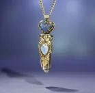 Tibetan Silver Necklace Accented with Labradorite Heart, Moonstone, and Clear Quartz Point. Stainless Steel Chain
