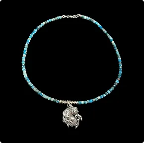 SS Rearing Horse Necklace accented with Appitite and SS Flying Saucer Charms.